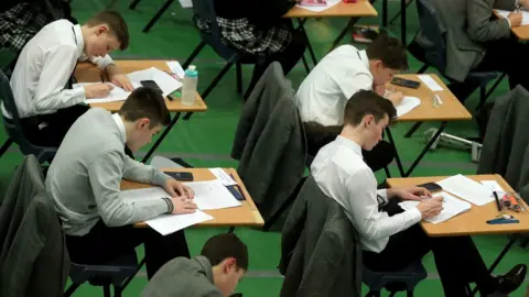 Children sitting a school exam