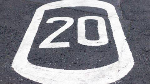 20mph sign in road