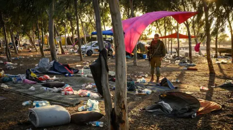 Leon Neal's photo captures an Israeli security forces officer after the Hamas attack on the Supernova music festival 