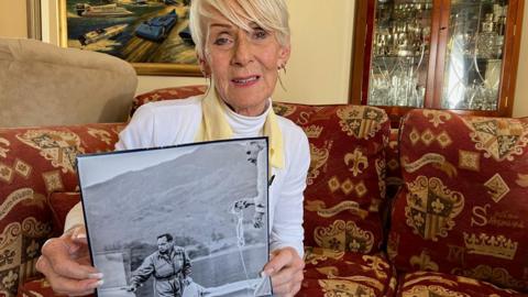 Gina Campbell with image of her father