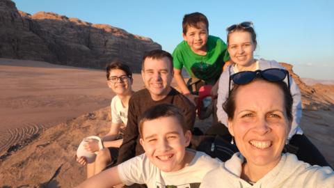 Katherine Miles with her family in Wadi Rum during their holiday