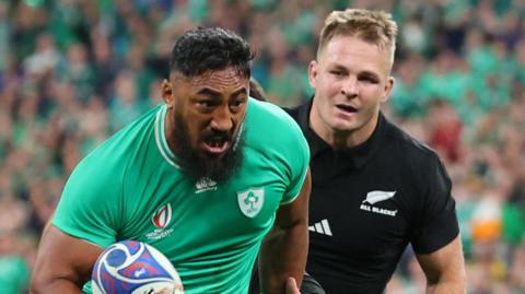 Bundee Aki and Sam Cane in action
