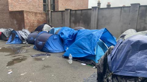  Tents are cleared after men who had been camping at the International Protection Office on Mount Street were taken by bus to a site at Crooksling on Saturday morning. Picture date: Saturday March 16, 2024. PA Photo