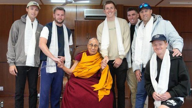 Some members of England's travelling party meet the Dalai Lama on Wednesday