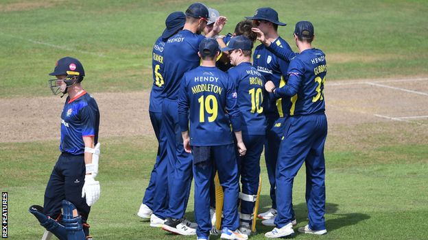 Scott Currie's burst of three wickets in four balls for Hampshire played a big part in limiting Lancashire to just 183