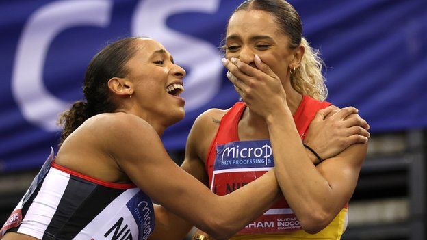 Silver medalist, Lina Nielsen (left), and gold medalist, Laviai Nielsen of Great Britain (right) celebrate following the women's 400m final