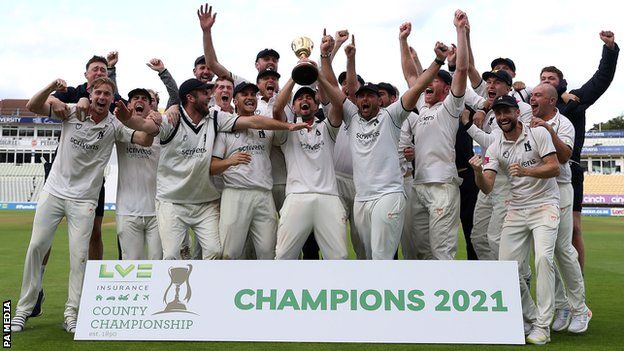 Warwickshire with the County Championship cup in 2021