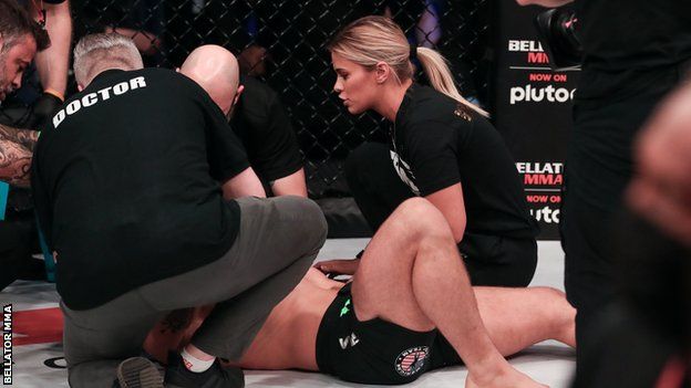 Paige Vanderford consoles Austin Vanderford after a knockout