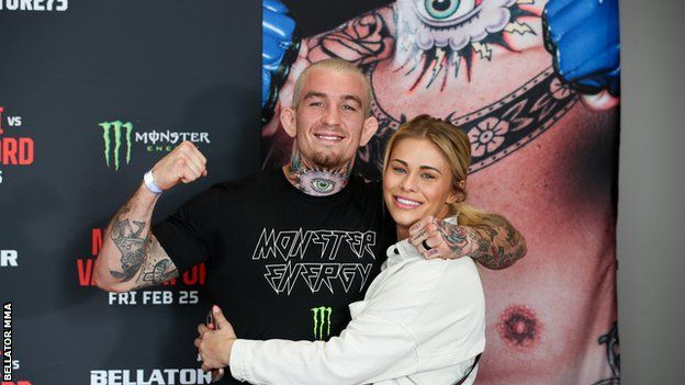 Paige VanZant and Austin Vanderford smile for a photo