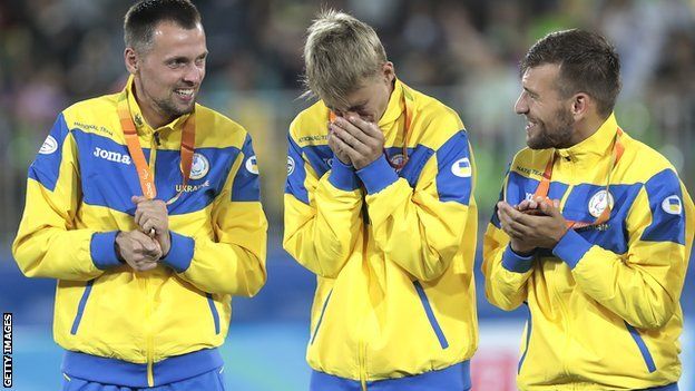 Ukraine footballers celebrate winning a gold medal in Rio