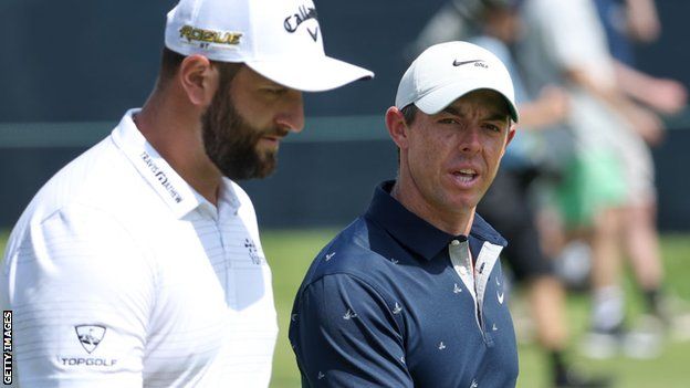 Jon Rahm and Rory McIlroy at the US Open on Monday