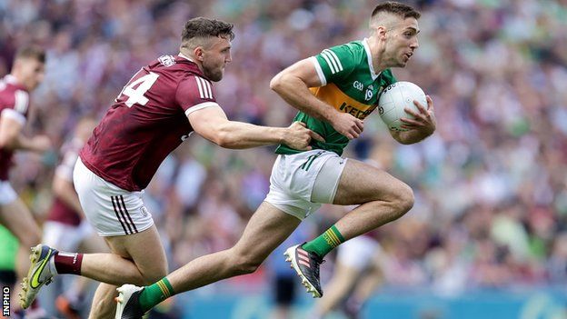 Half-time substitute Adrian Spillane bursts away from Damien Comer at Croke Park