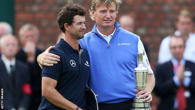 Ernie Els consoles Adam Scott after the 2012 Open Championship