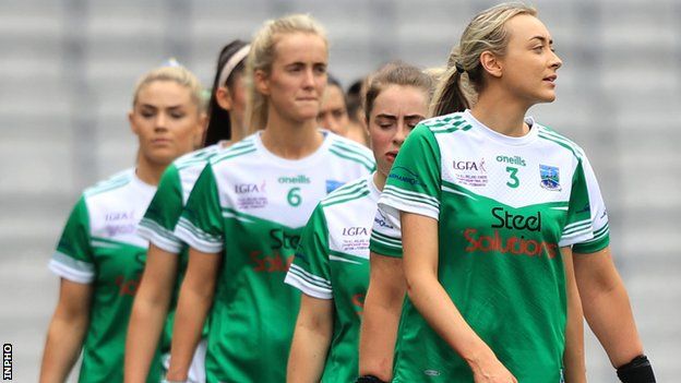 Molly McGloin (right) leads out Fermanagh at Croke Park on 31 July