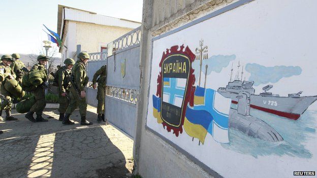 Russian troops enter a military base in Perevalnoye, near the Crimean city of Simferopol, March 21, 2014.