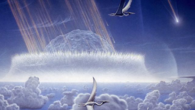 Illustration of dinosaurs and asteroid hitting Earth
