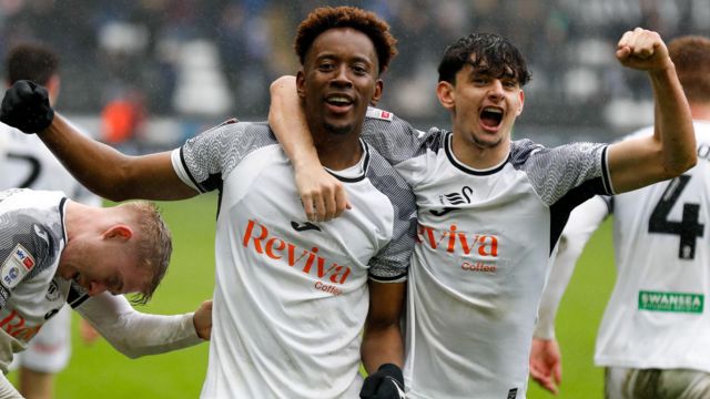 Jamal Lowe and Charlie Patino celebrate during Swansea's win over Cardiff