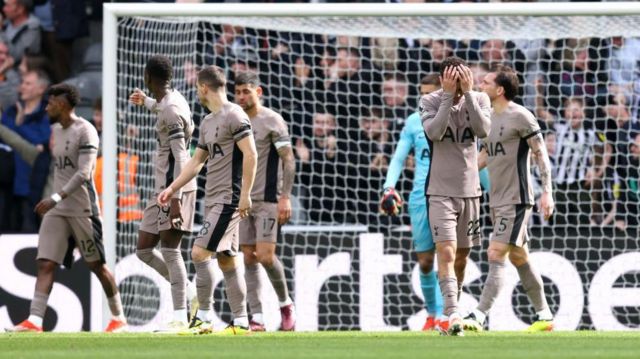 Tottenham's players look dejected after conceding their fourth goal against Tottenham