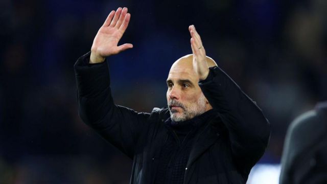 Pep Guardiola, Manager of Manchester City, applauds the fans