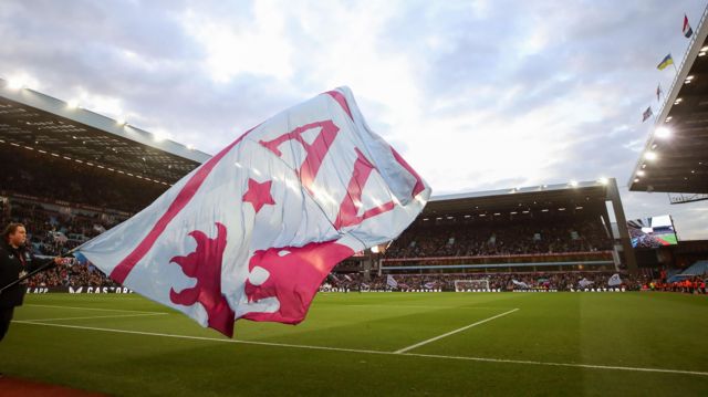 Aston Villa flag being waved inside Villa Park