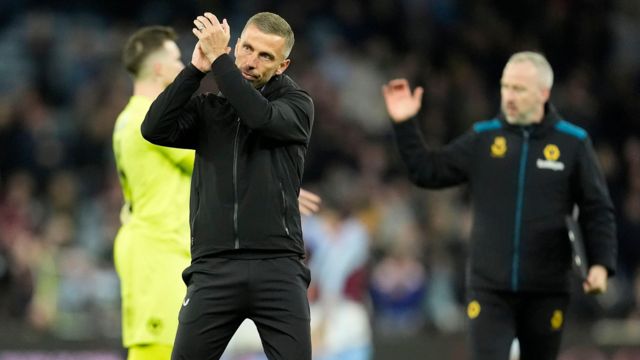 Wolves manager Gary O'Neil claps his fans after their 2-0 defeat at Aston Villa