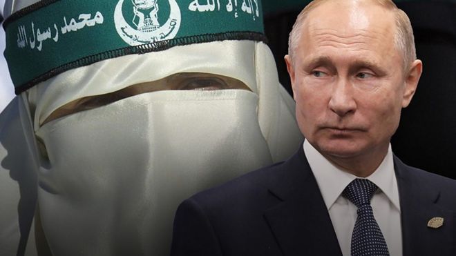Владимир Путин на фоне участника движения ХАМАС