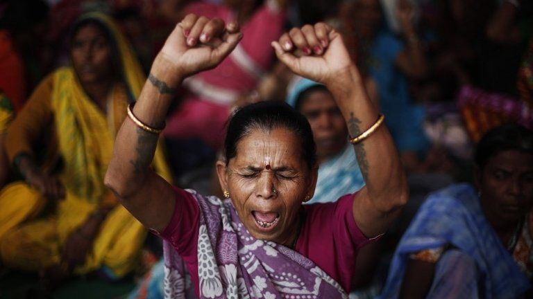 Victims of the Bhopal gas tragedy, a gas leak from a Union Carbide pesticide plant that killed at least 3500 people, shout slogans during a sit-in protest in New Delhi November 10, 2014.