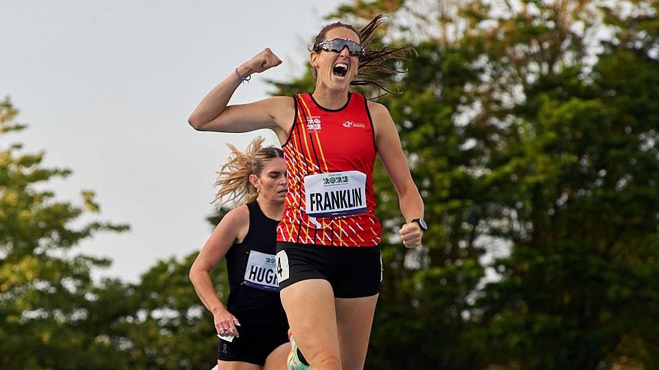 Rachael Franklin crossing the finish line
