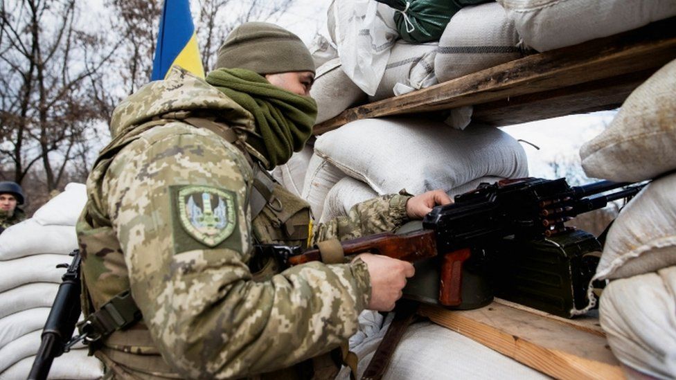 Ukrainian service member seen at a check point in Zhytomyr