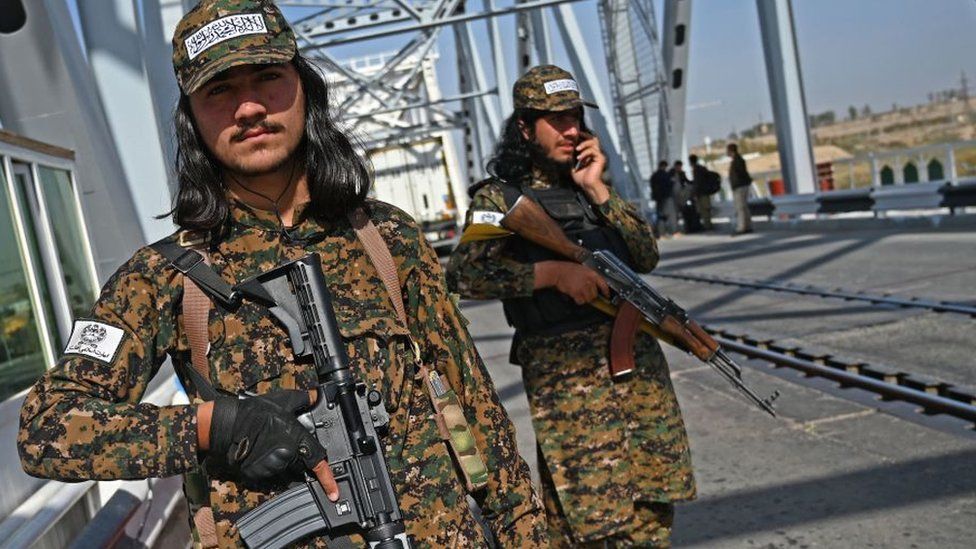 Taliban border guards on bridge near Uzbek border