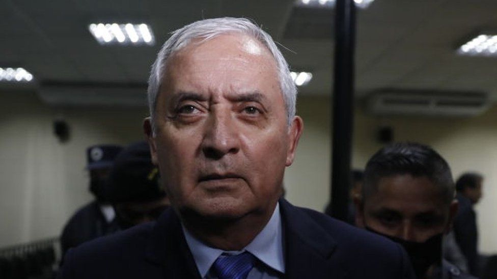 Guatemalan former President Otto Perez Molina, who sentence to 16 years, leaves at the court with police members after his trial in Guatemala City, Guatemala on December 07, 2022