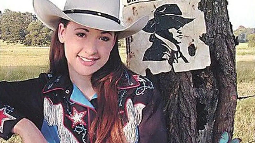 A young Kacey Musgraves on the cover of her album Wanted: One Good Cowboy