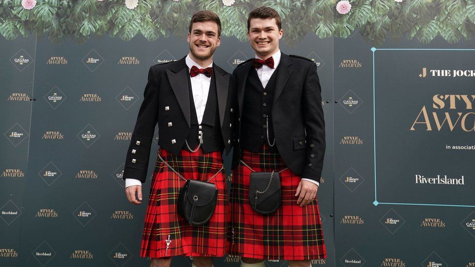 Two men dressed in kilts at Aintree Ladies Day 2024