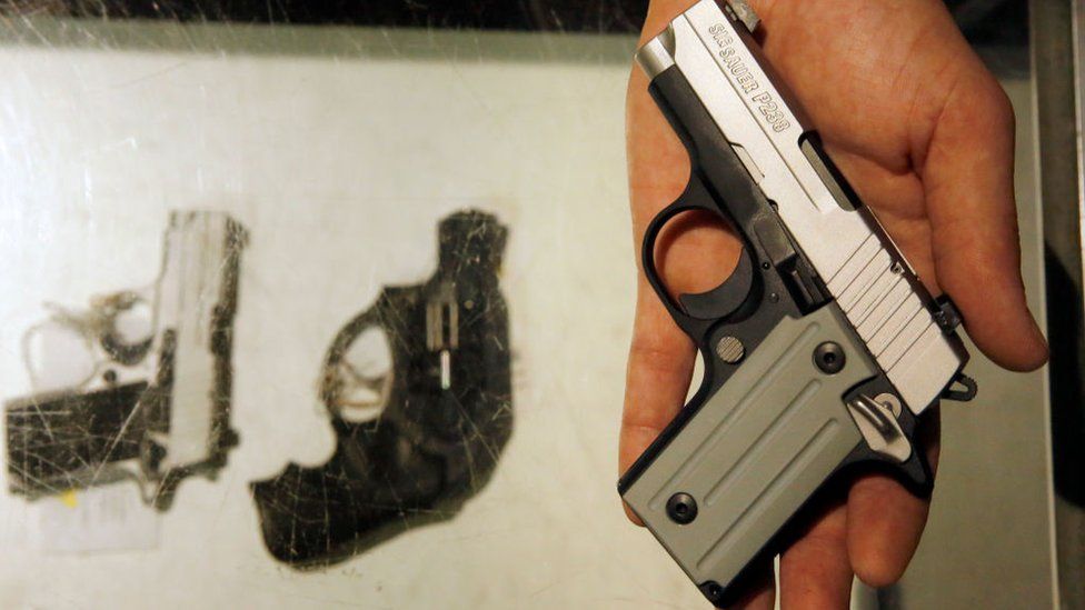 Image shows three handguns