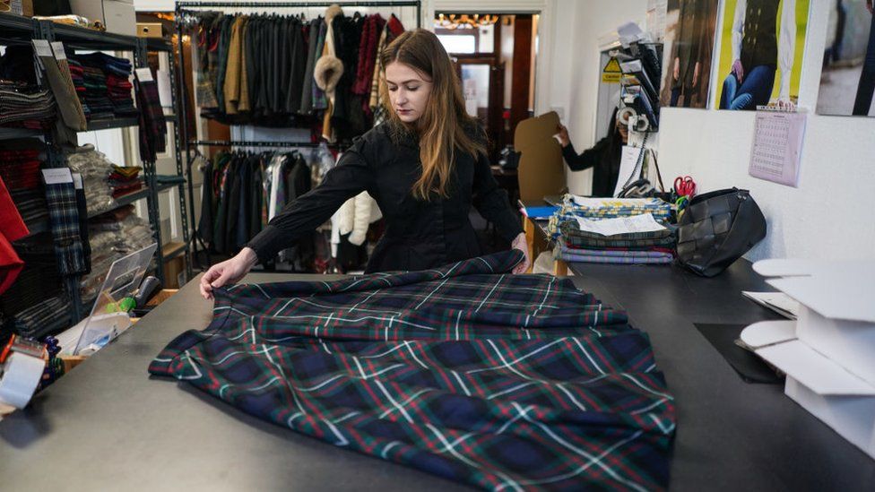 Bogdana Karlova working at a tartan company in Keith in May, after arriving in Scotland in March