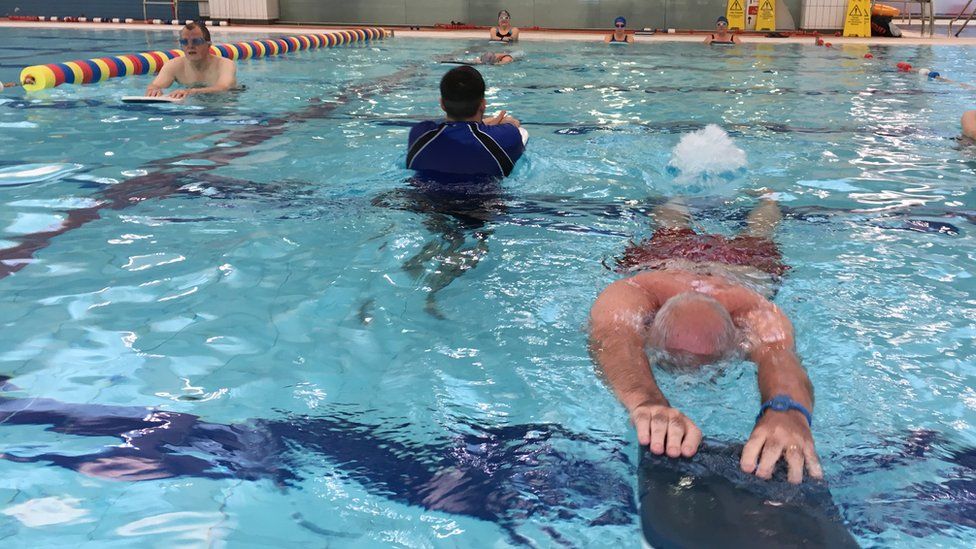 Adult learners in the swimming pool in Derry.