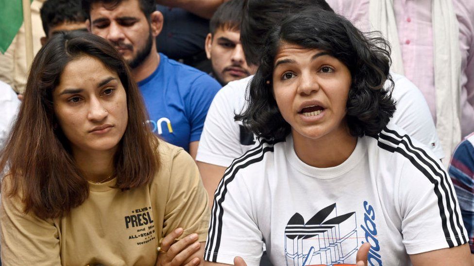 Wrestlers Vinesh Phogat, Sakshi Malik and others address a press conference during their protest against the Wrestling Federation of India at Jantar Mantar, on April 23, 2023 in New Delhi, India.