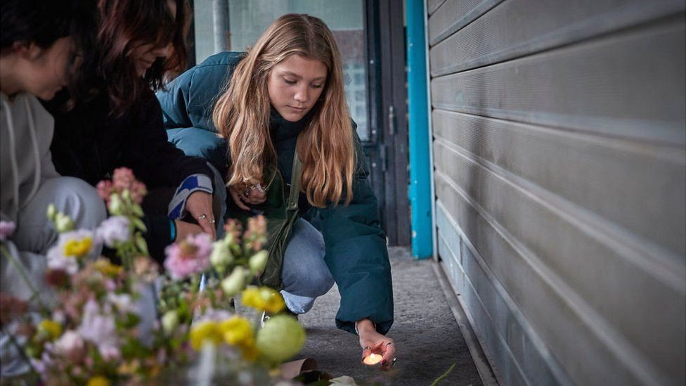 Parisians light candles in memory of the victims of the 13 November 2015 Paris terror attacks at La Belle Equipe restaurant, one of the scenes of the attacks, France, 2021