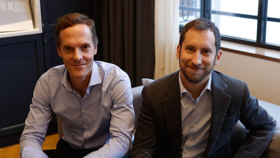 Co-founders of US start-up company Juul, Adam Bowen (L) and James Monsees pose in Paris on december 5, 2018.