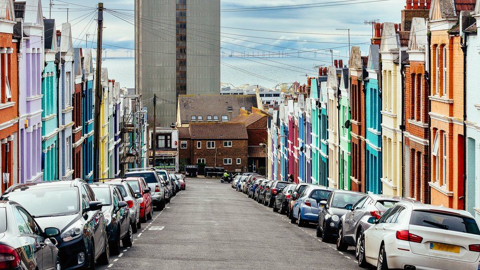 Cars parked in a road in Brighton