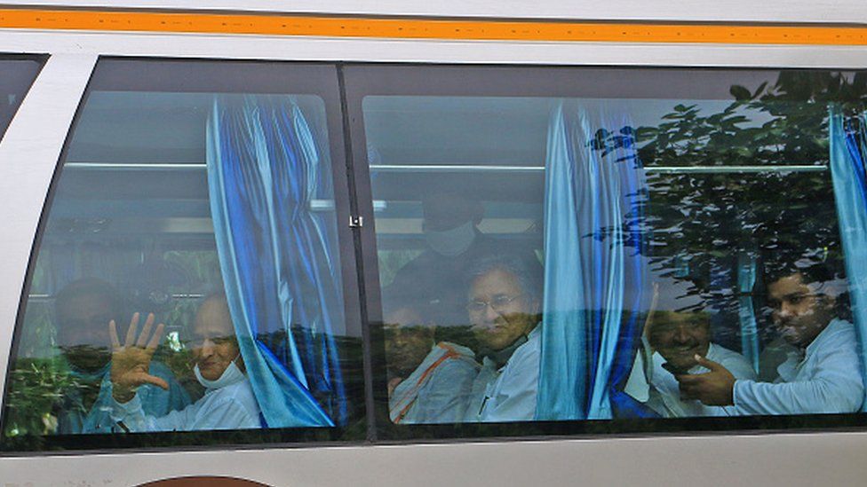 Rajasthan Chief Minister Ashok Ghelot along with party leaders and MLA's boards a bus towards a hotel after a meeting with CM Ashok Gehlot, in Jaipur, Monday, July 13, 2020. The meeting, meant to be a show of strength for Gehlot comes in the backdrop of a open rebellion by Deputy CM Sachin Pilot.