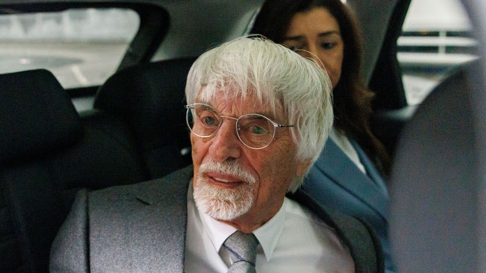 Former chief executive of the Formula One Group Bernie Ecclestone leaves Southwark Crown Court after pleading guilty to a fraud charge in London, Britain, on 12 October 2023