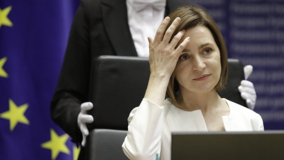 Moldovan President Maia Sandu reacts after addressing a plenary session of the European Parliament in Brussels, Belgium, 18 May 2022
