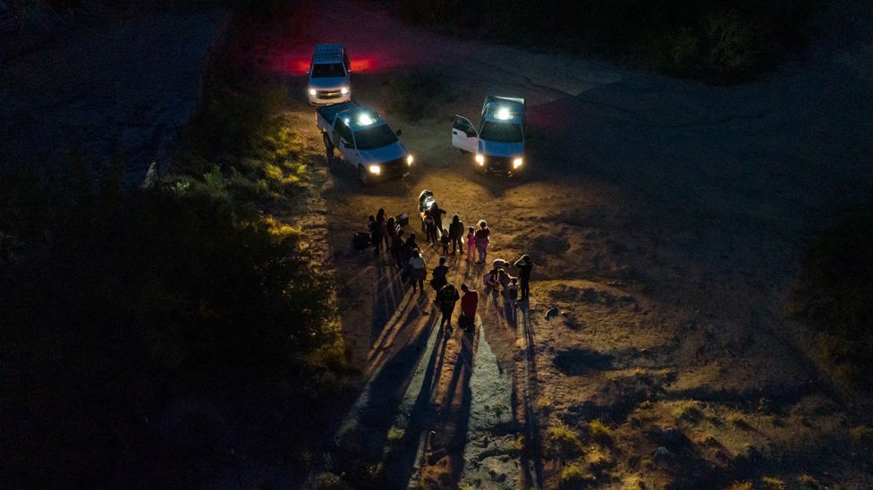 Asylum-seeking migrants from Central and South America are registered by border patrol agents after they crossed the Rio Grande river into the United States from Mexico in Roma, Texas, U.S., June 13, 2022.