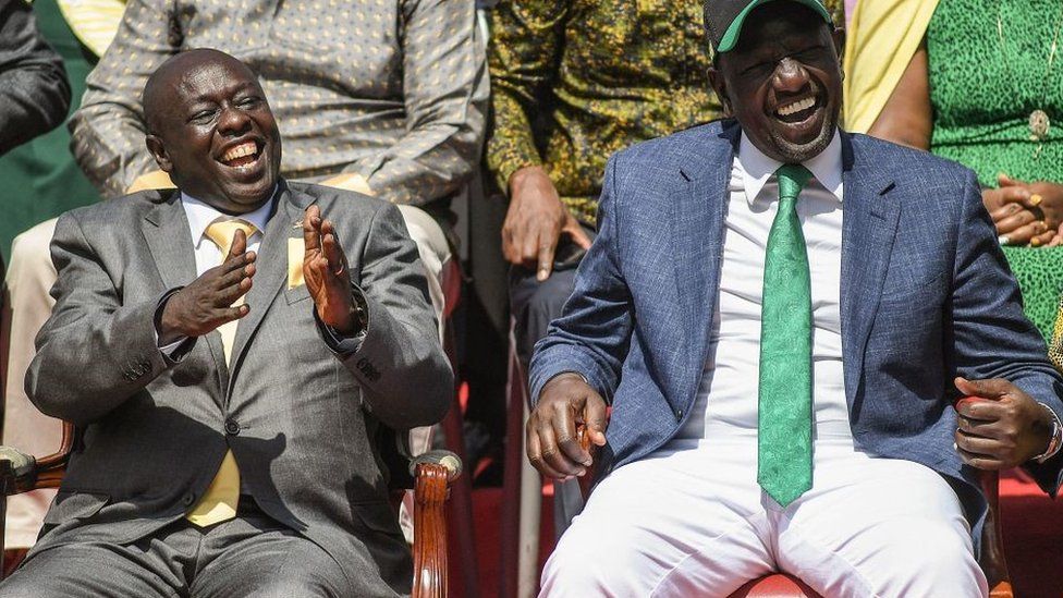 Kenya's Deputy President, William Ruto (R) sits next to his running mate Rigathi Gachagua, at the Deputy's official residence in Karen, Nairobi, on May 15, 2022