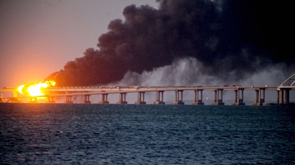 A fire following an explosion at the Kerch bridge, October 2022