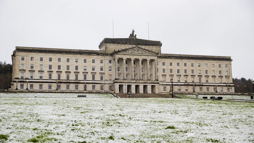 Stormont Building in winter with snow covered lawns