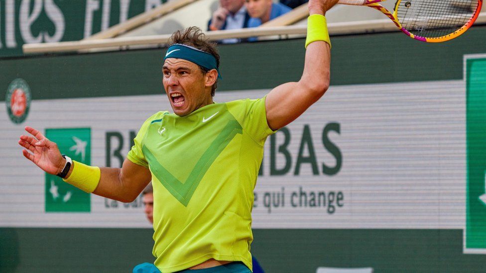 Rafael Nadal of Spain plays a forehand against Felix Auger-Aliassime of Canada during the Men's Singles Fourth Round match on Day 8 of The 2022 French Open at Roland Garros on May 29, 2022