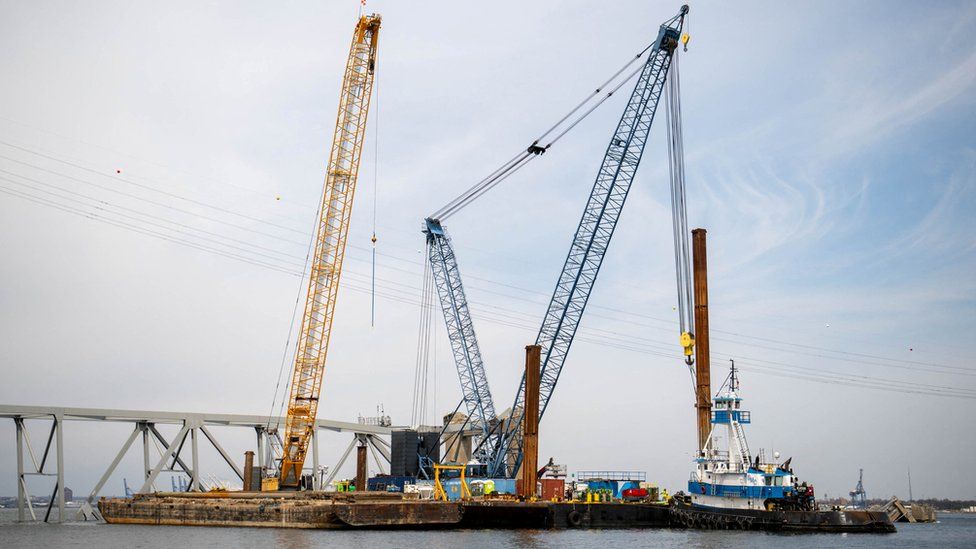 Barge cranes near the collapsed Francis Scott Key Bridge in Baltimore.