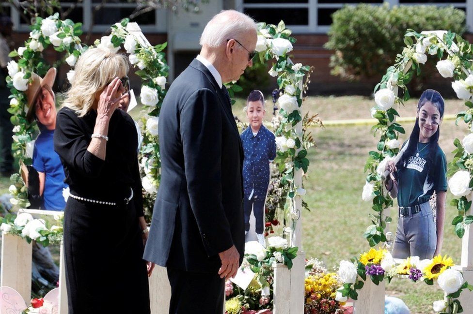 U.S. President Joe Biden and first lady Jill Biden pay their respects at the Robb Elementary School memorial